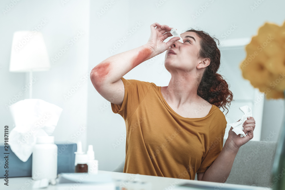 Woman using self-medication while having strong allergy Woman using self-medication while having strong allergy