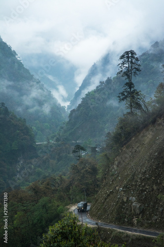 Transport vehicle in high mountain passes at Lachun, Sikkim, India photo