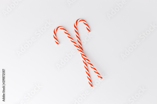 Candy cane on a white background. Christmas sweets.