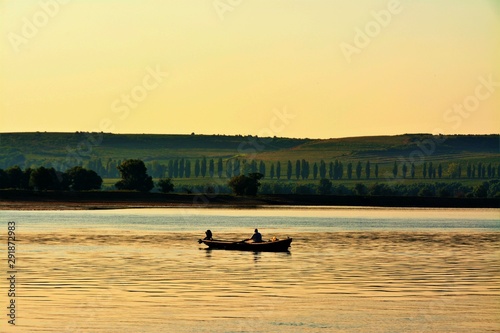a boat with fishermen on the Danube
