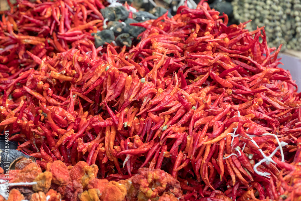Dried red hot chili peppers in the market
