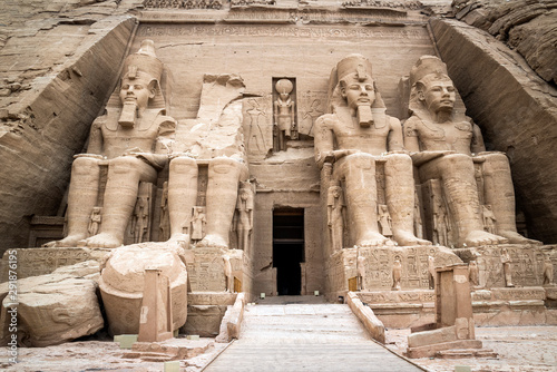 Four colossal statues of the pharaoh Ramses II guarding the entrance of the Great Temple of Ramesses II, Abu Simbel historic site, Aswan governorate, Egypt photo