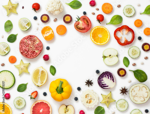 Fototapeta Naklejka Na Ścianę i Meble -  Cross section sliced vegan food on coloured background still life image.