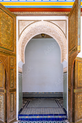 Colorful entrance door to a inner chamber of the Ben Youssef Madrasa