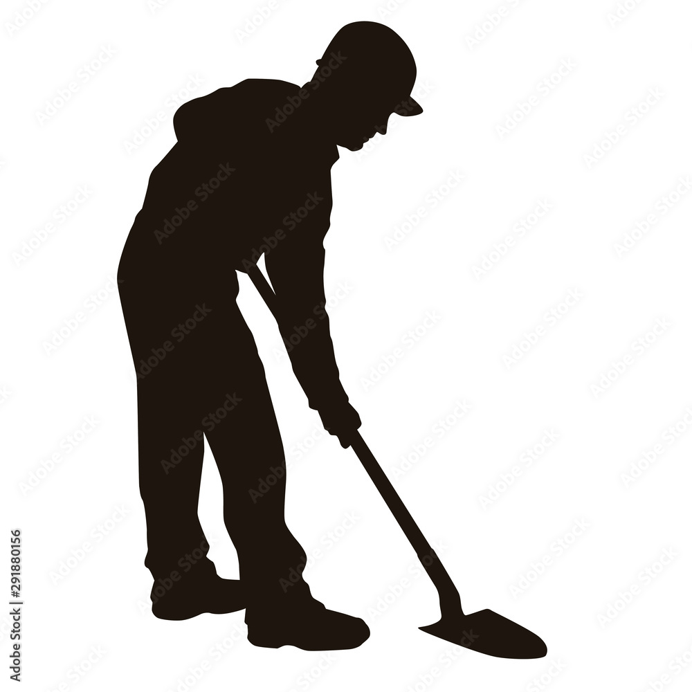 Silhouette of a worker using a shovel Silhouette of a worker using a shovel