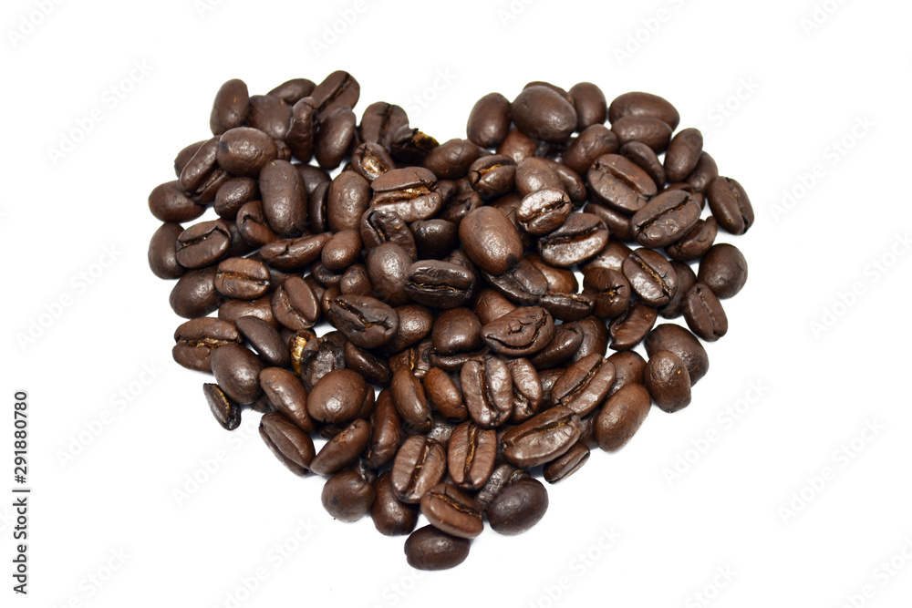 Coffee beans in the shape of a heart on a white background Coffee beans in the shape of a heart on a white background