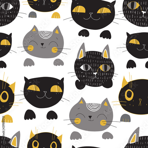 Cute cats muzzles seamless pattern. Artistic nursery background.
