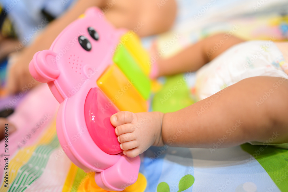 Baby playing Playgym with thier feet Baby playing Playgym with thier feet