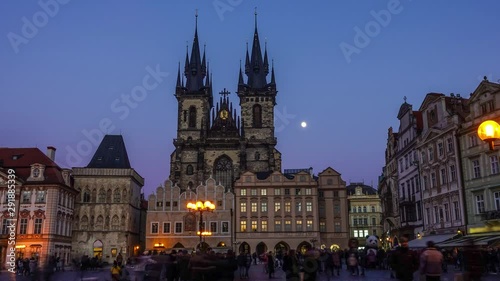 time lapse of night scene at Staromestka square  and old gothic Tyn Church in evening Prague, Bohemia, Czech Republic photo