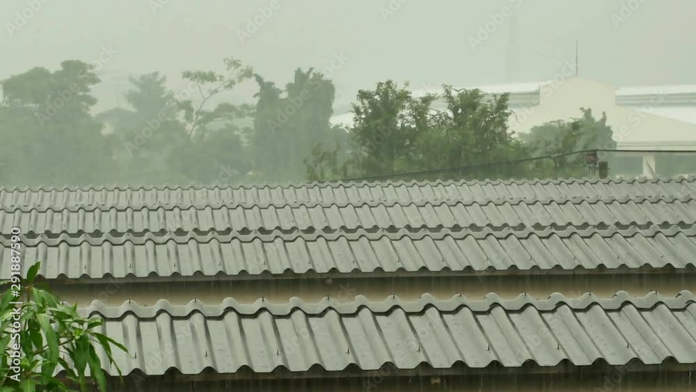 Raining droplets drop falling on old roof. Hard rain drop and splashing on old roof. Raining droplets drop falling on old roof. Hard rain drop and splashing on old roof.