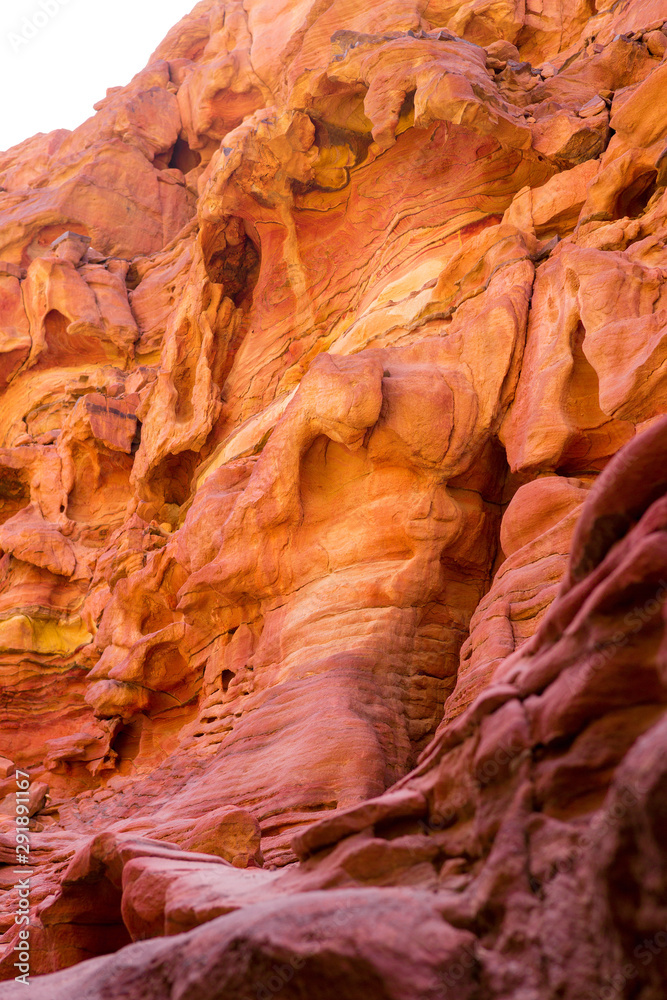 Coloured Canyon is a rock formation on South Sinai (Egypt) peninsula. Desert rocks of multicolored sandstone background. Coloured Canyon is a rock formation on South Sinai (Egypt) peninsula. Desert rocks of multicolored sandstone background.