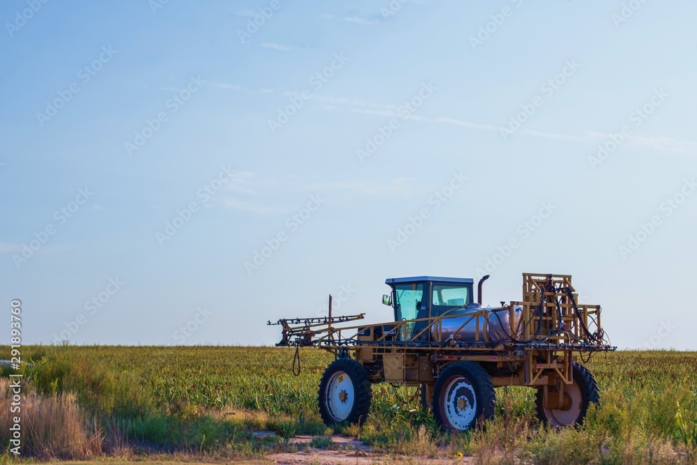 Fototapeta premium Crop Spayer in Field
