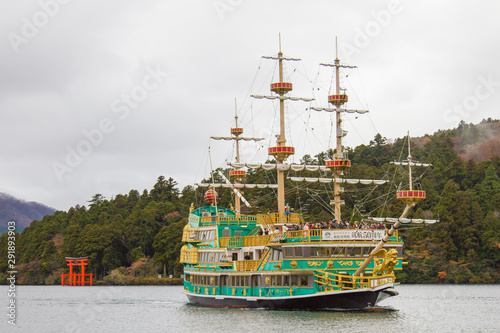Pirate ship on Lake Ashi Japan There is a torii gate behind.