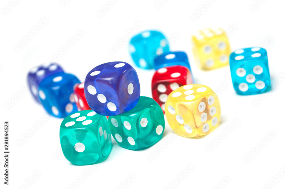 Closeup of colorful dices on white background Closeup of colorful dices on white background