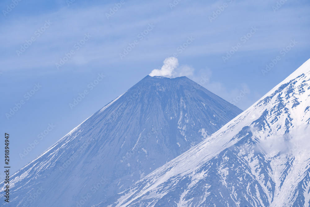 view on Kamen Volcano, active Klyuchevskoy Volcano and active Bezymianny Volcano. view on Kamen Volcano, active Klyuchevskoy Volcano and active Bezymianny Volcano.