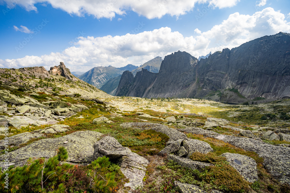 Gorgeous view on top of western Sayan mountain range during summer sunny day in Ergaki national park, Siberia, Russia