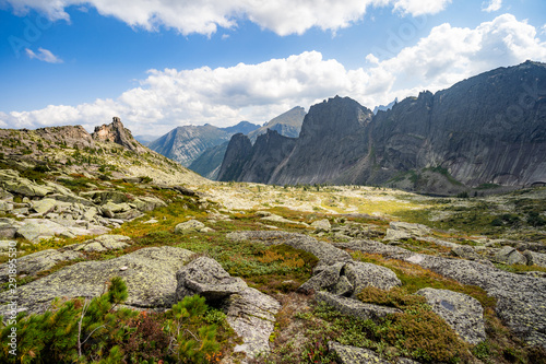 Gorgeous view on top of western Sayan mountain range during summer sunny day in Ergaki national park, Siberia, Russia