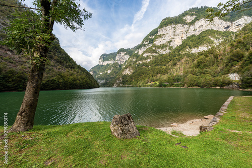 Lago Schener, small artificial lake in the Alps, Trentino Alto Adige and Veneto, Pontet, Fiera di Primiero, Italy, Europe photo