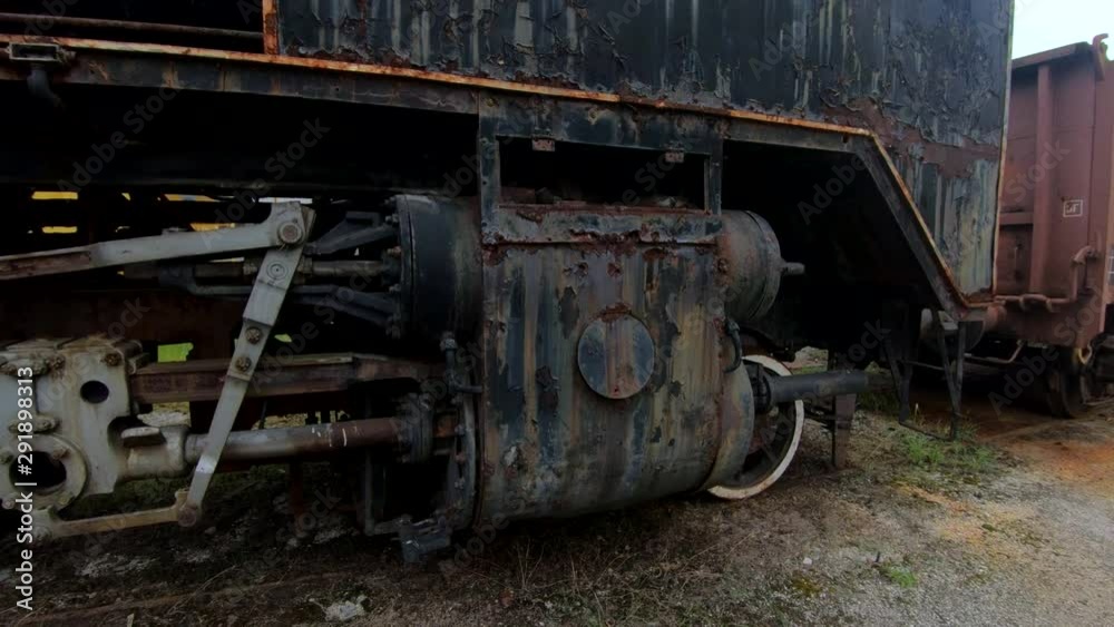4K Backwards moving left pan old rusty abandoned steam locomotive 4K Backwards moving left pan old rusty abandoned steam locomotive
