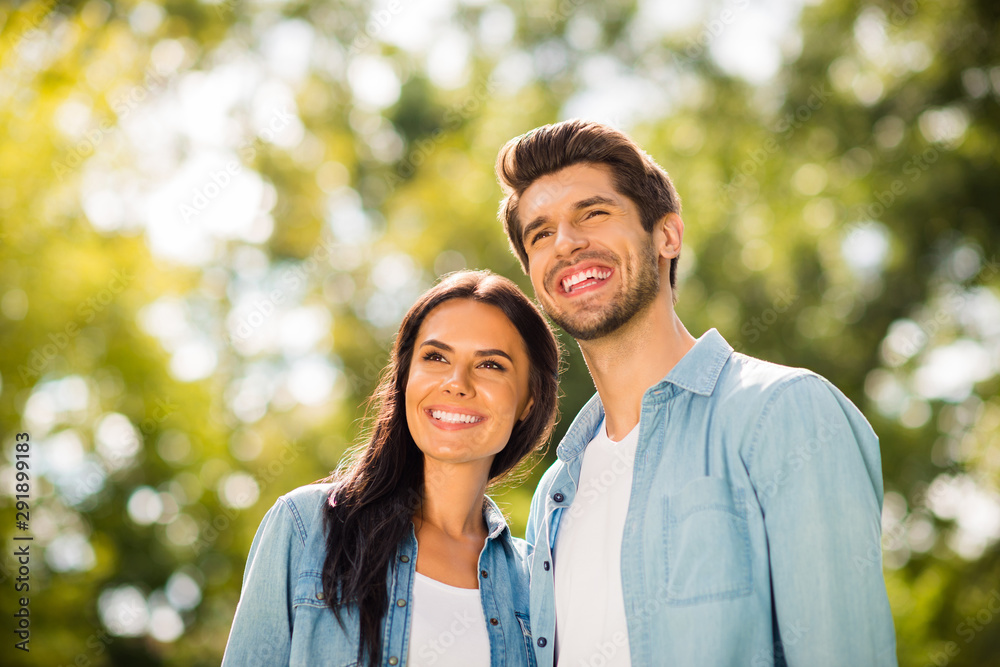 Photo of overjoyed pair attending green summer park wear denim outfit Photo of overjoyed pair attending green summer park wear denim outfit