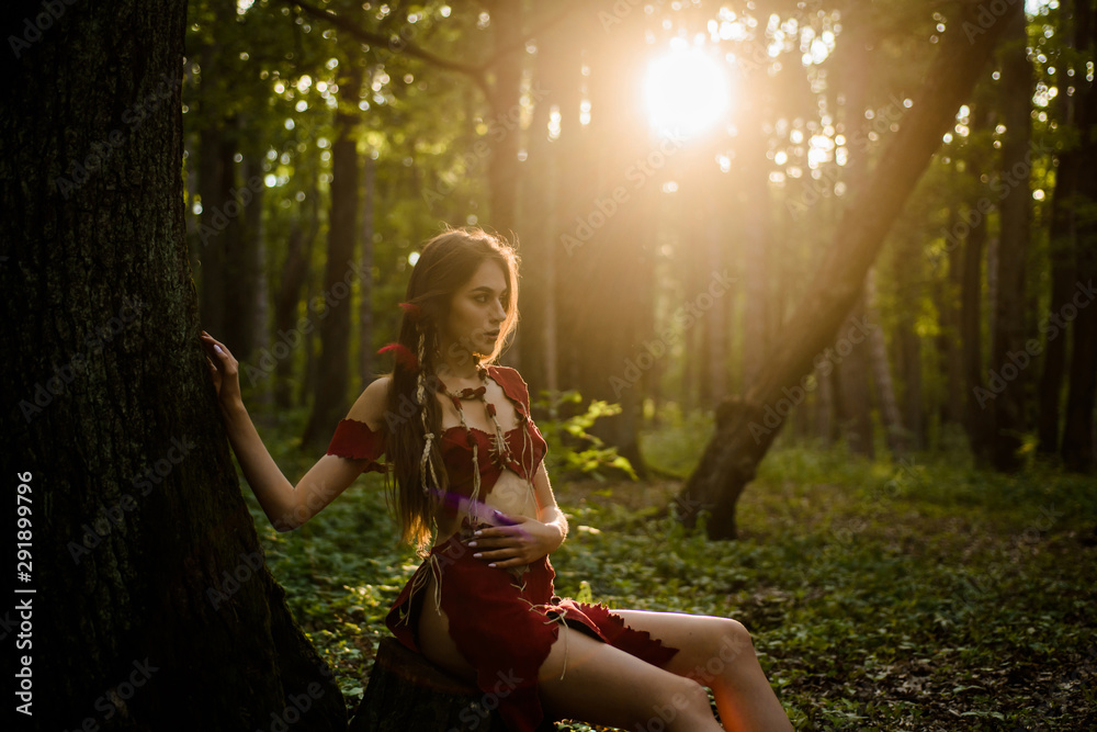 Female spirit mythology. Living wild life untouched nature. Sexy girl. Wild  human. Wilderness of virgin woods. She belongs tribe warrior women. Wild  attractive woman in forest. Folklore character Stock Photo | Adobe