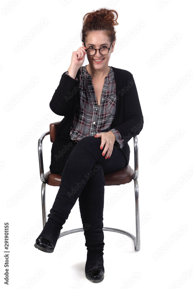 woman sitting on a chair on white background woman sitting on a chair on white background