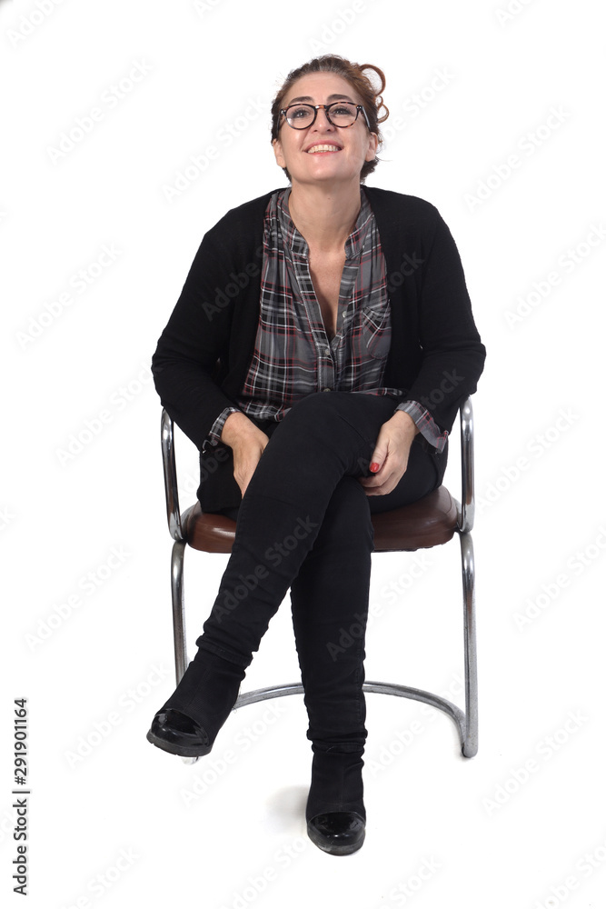 woman sitting on a chair on white background woman sitting on a chair on white background
