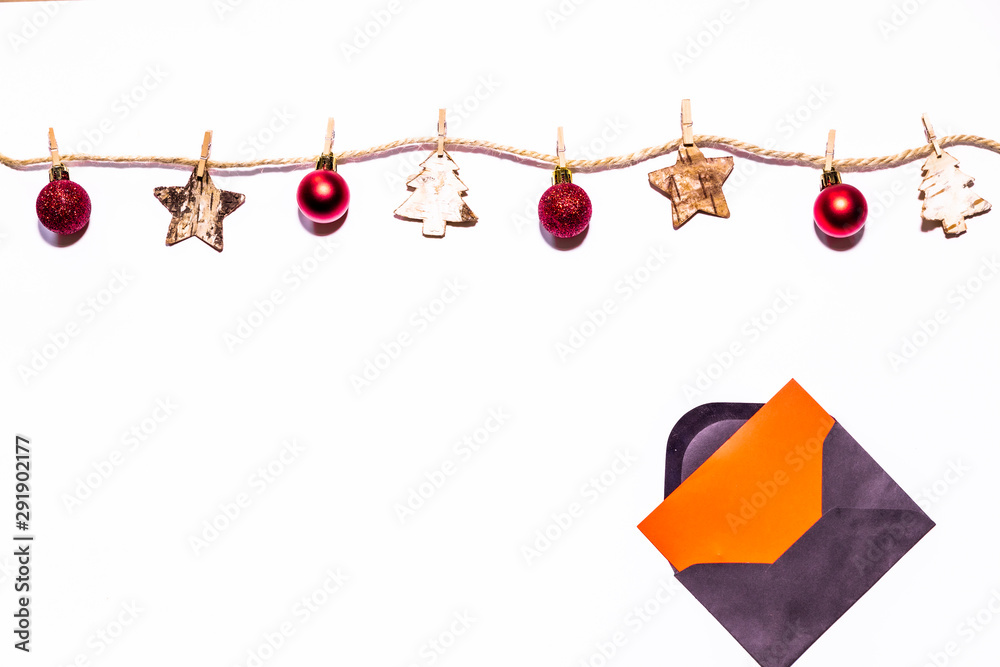 Christmas background with hanging ornaments isolated in white