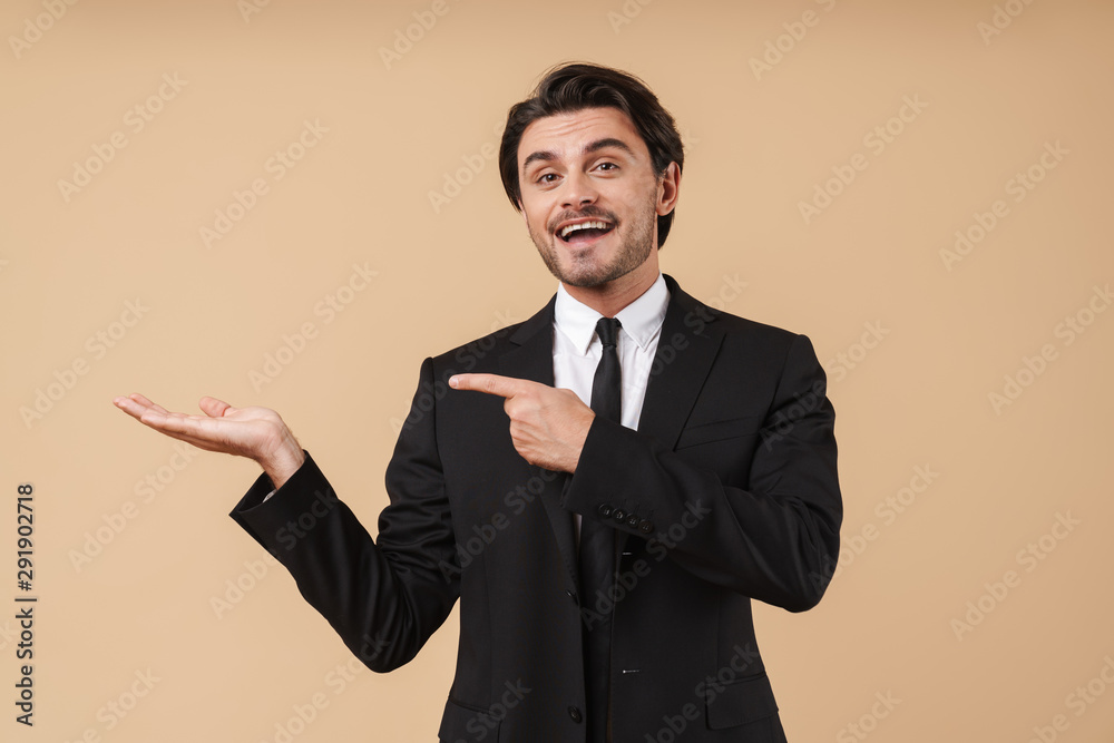 Portrait of a handsome young businessman wearing suit Portrait of a handsome young businessman wearing suit