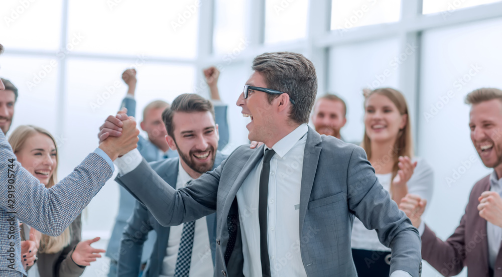 close up. happy business colleagues shaking hands. close up. happy business colleagues shaking hands.