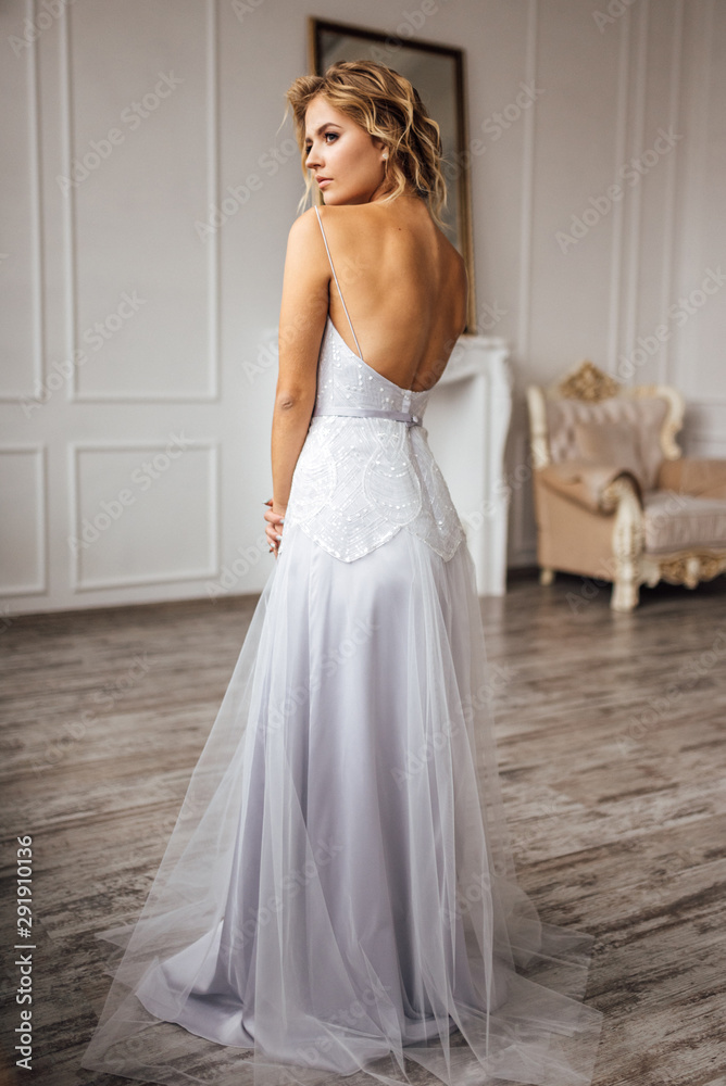 bride in beautiful dress in white Studio bride in beautiful dress in white Studio