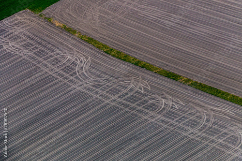 Patern of tire tracks on a plowed field