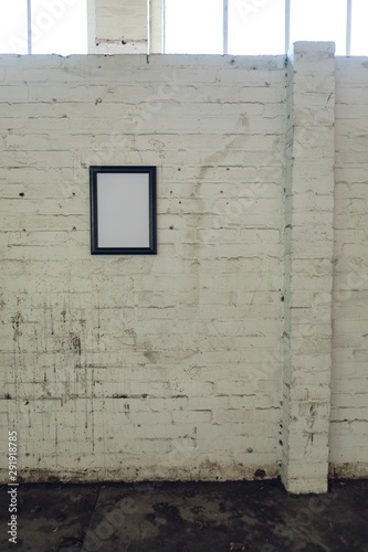 Blank picture hanging on a wall