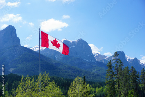 Rocky mountains at Canmore, Alberta, Canada, Canadien flag, Nordic Centre photo