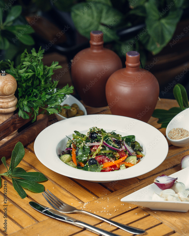 Vegetable salad with olives and onions Vegetable salad with olives and onions