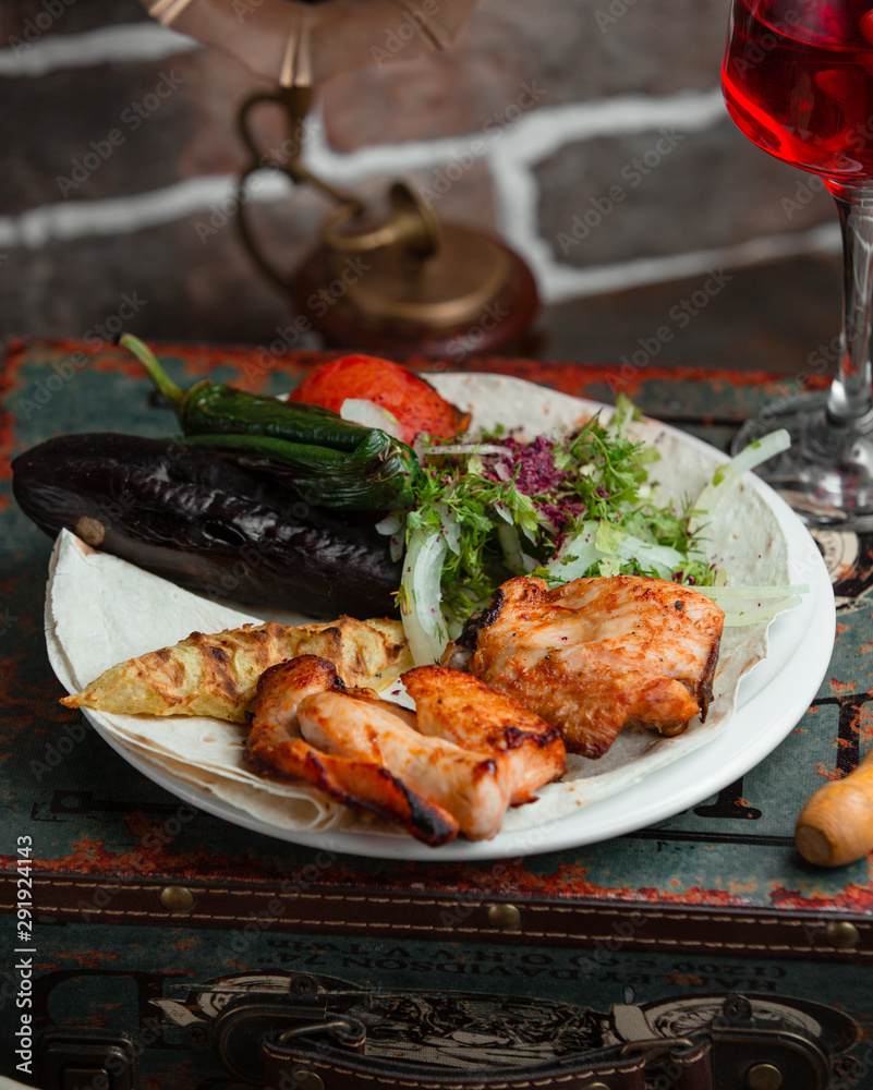 Azeri chicken kebab with charcoal vegetables Azeri chicken kebab with charcoal vegetables