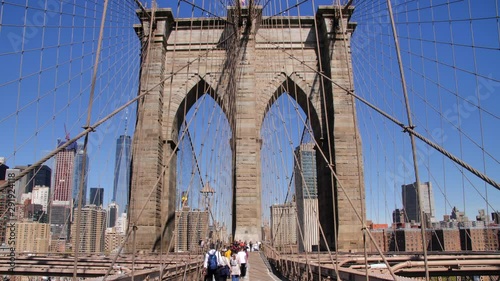 People Walking on Brooklyn Bridge and Manhattan Skyline, NYC New York City