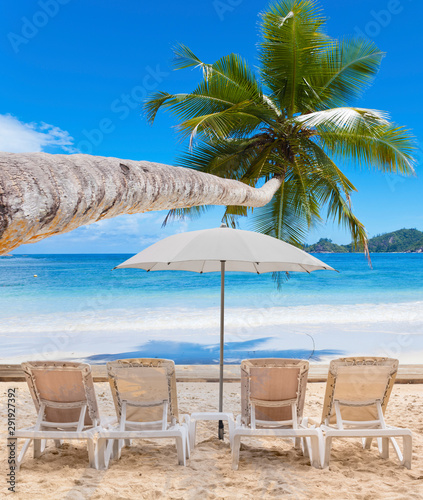 beach with chairs and umbrellas  Seychelles Islands 