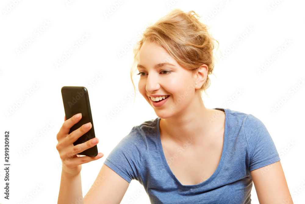 Happy woman looks surprised on smartphone Happy woman looks surprised on smartphone