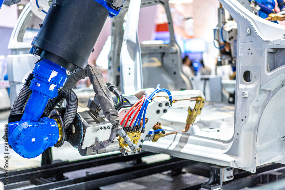 robot arm working in car factory robot arm working in car factory