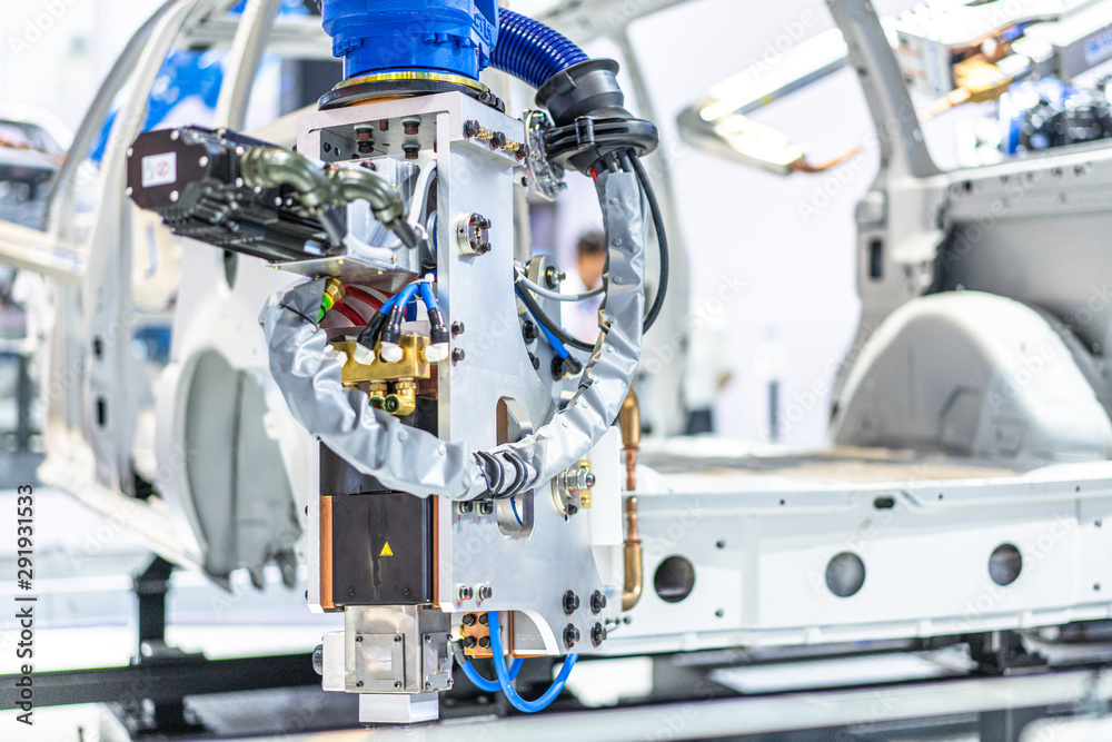 robot arm working in car factory robot arm working in car factory