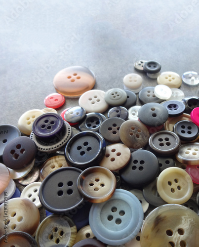 Various Sizes and Colors of Sewing Buttons (Background)