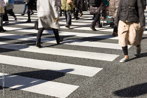 Busy pedestrian crossing at Tokyo © danielskyphoto
