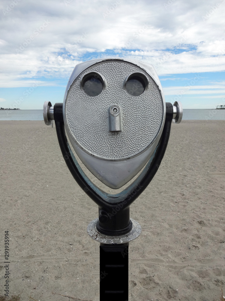Beach binocular viewer at Silver Sands Beach in Milford, Connecticut, USA Beach binocular viewer at Silver Sands Beach in Milford, Connecticut, USA