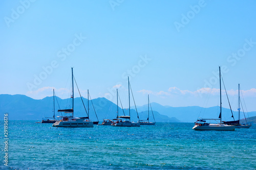 Sail yachts in the sea near Aegina Island © Roman Sigaev