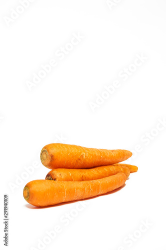 carrots isolated white background , portrait orientation natural color