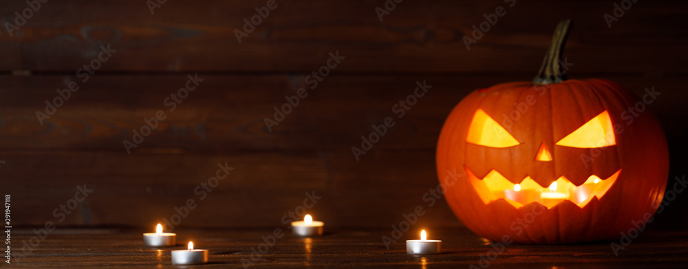 Fototapeta premium Halloween pumpkin and candles