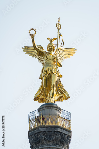 Close-up of golden angel satue and berlin Victory Column, a monument to commemorate the Prussian victory in the Danish-Prussian War and defeated Austria and Austro-Prussian War & France