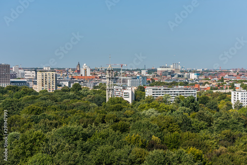 Panoramic city view of Berlin from the top of the Berlin Victory Column in Tiergarten, Berlin, with modern skylines and churches. © zz3701