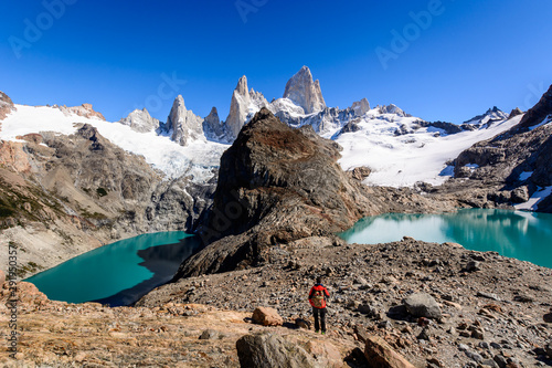 A tourist is admiring Laguna De Los Trek and and Fitz Roy Mountain,  Los Glaciares National Park, Patagonia, Argentina